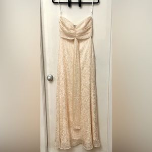 Lulu’s “Met Your Match” cream strapless ruched maxi dress.